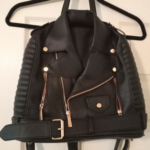 Black leather motorcycle jacket backpack